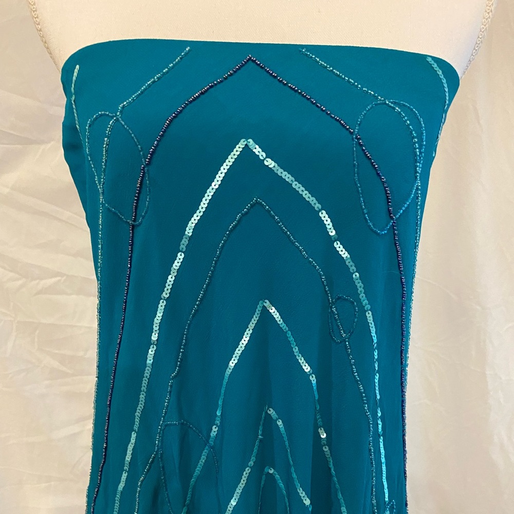 Strapless dress from brand MANGO